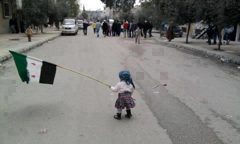 Syria - Flag - Child with flag - homsuptodatenews - 30-3-2013