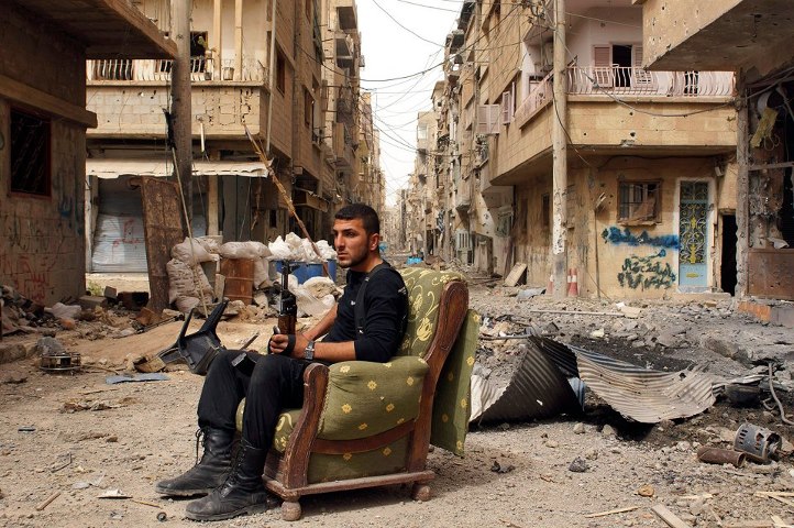 Syria - Destruction - FSA on chair