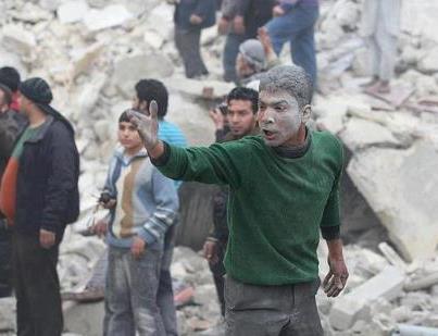 Syria - Trauma -Man amidst destruction - homsuptodatenews - 3-2-2013